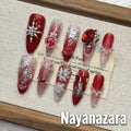 Red New Year Castle Fireworks Cat Eye Press-on Nails | Nayanazara